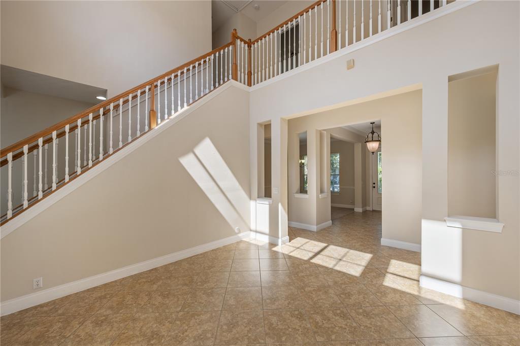 11905 Camden Park Drive Windermere, FL 34786 - Photo 11 of 32 a view of an entryway with wooden floor