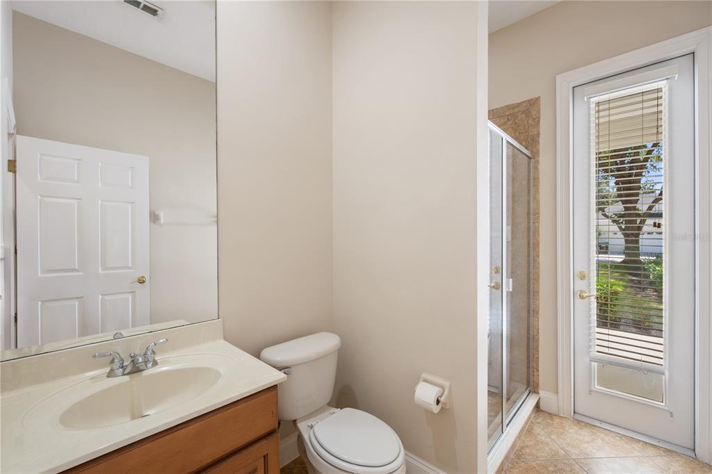 11905 Camden Park Drive Windermere, FL 34786 - Photo 12 of 32 a bathroom with a sink toilet and vanity