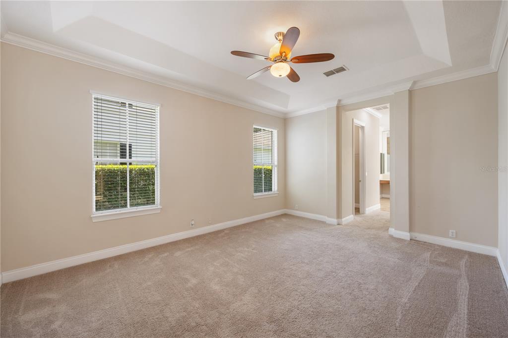 11905 Camden Park Drive Windermere, FL 34786 - Photo 13 of 32 an empty room with windows and fan