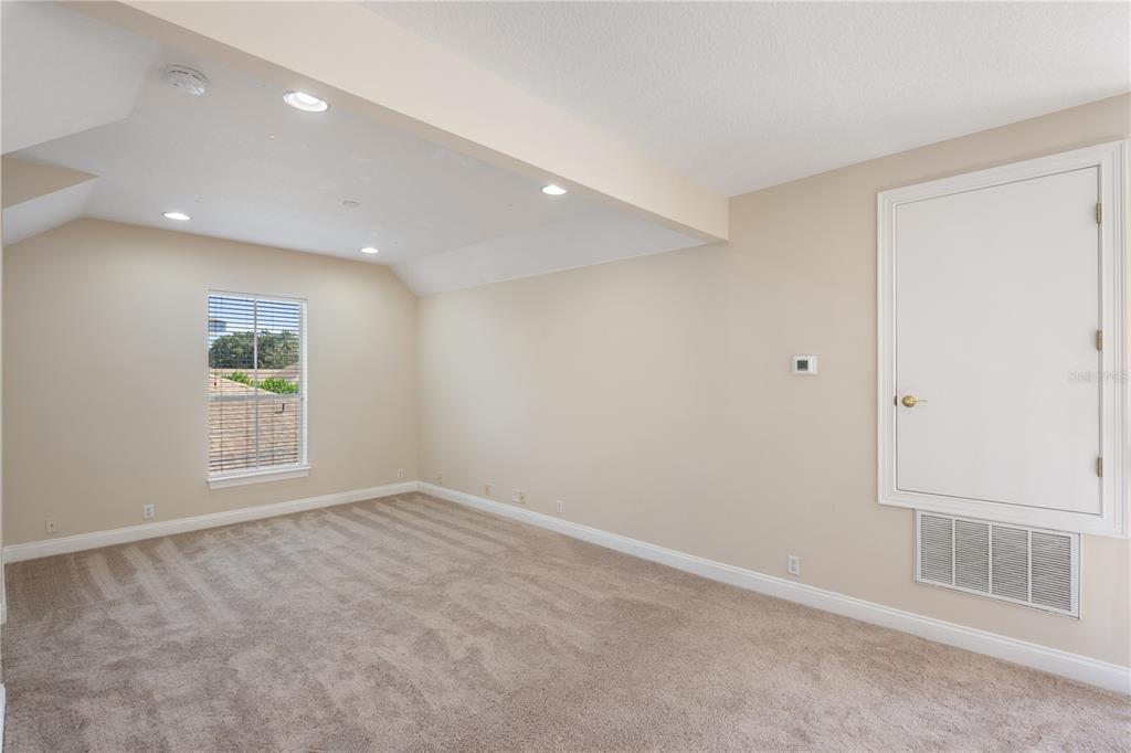 11905 Camden Park Drive Windermere, FL 34786 - Photo 22 of 32 an empty room with windows