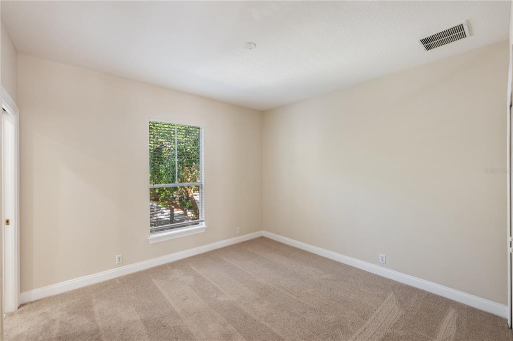 11905 Camden Park Drive Windermere, FL 34786 - Photo 24 of 32 an empty room with windows