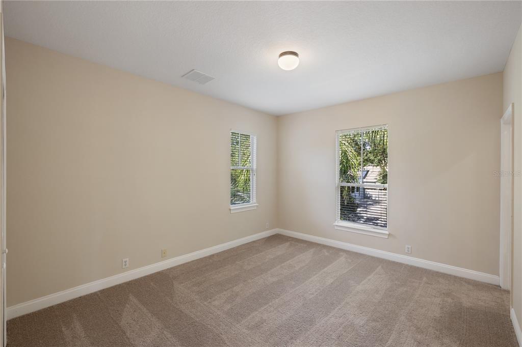 11905 Camden Park Drive Windermere, FL 34786 - Photo 26 of 32 an empty room with windows
