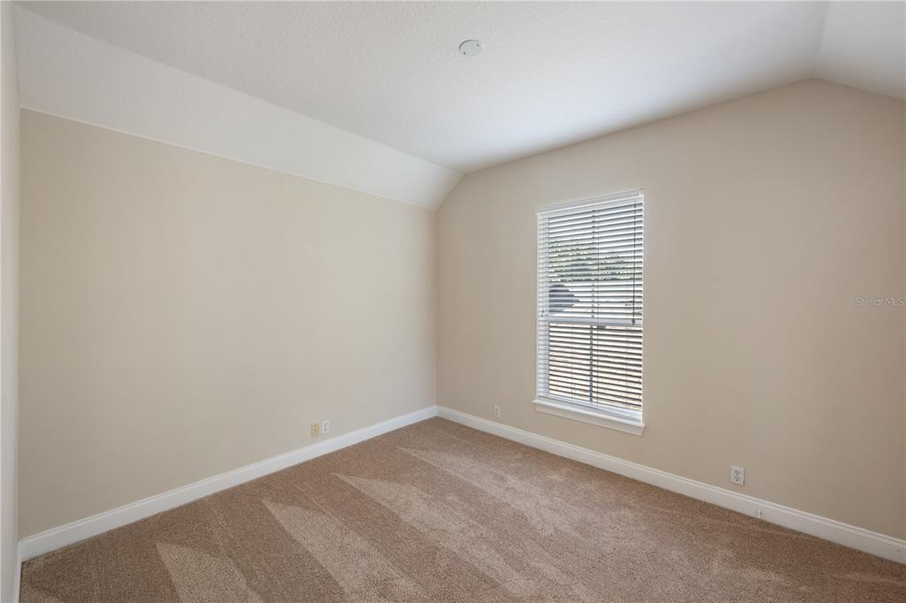 11905 Camden Park Drive Windermere, FL 34786 - Photo 27 of 32 an empty room with a window
