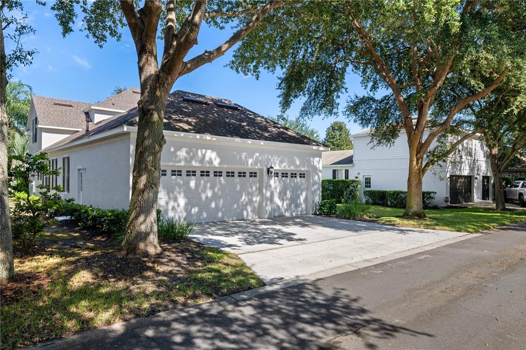 11905 Camden Park Drive Windermere, FL 34786 - Photo 31 of 32 a view of street along with house and trees