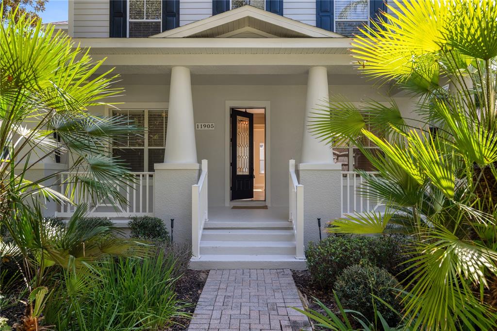 11905 Camden Park Drive Windermere, FL 34786 - Photo 4 of 32 a front view of a house with a yard