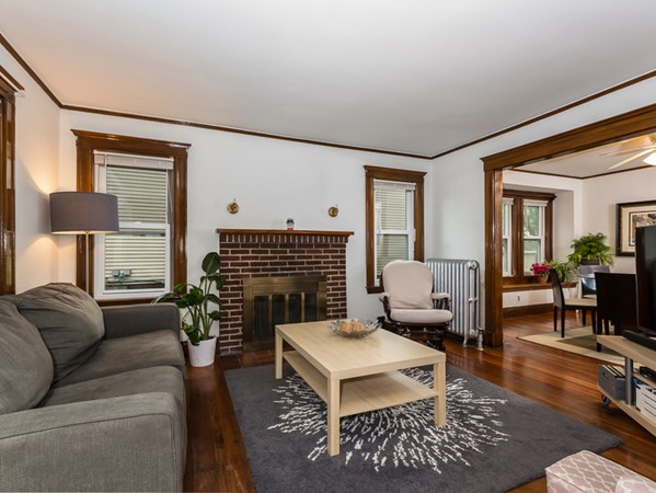 348 Lagrange Street Boston, MA 02132 - Photo 4 of 25 a living room with furniture