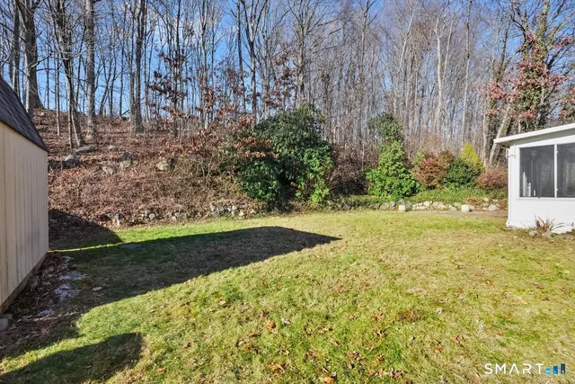 a view of backyard with outdoor space