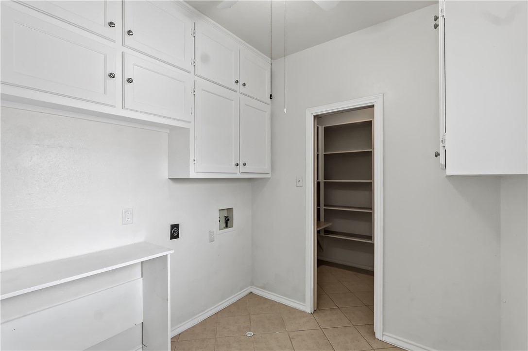 904 Bob White Street Bryan, TX 77802 - Photo 16 of 36 a view white cabinets