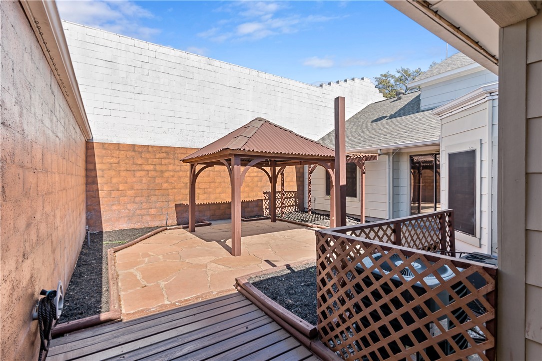 904 Bob White Street Bryan, TX 77802 - Photo 27 of 36 a patio with table and chairs