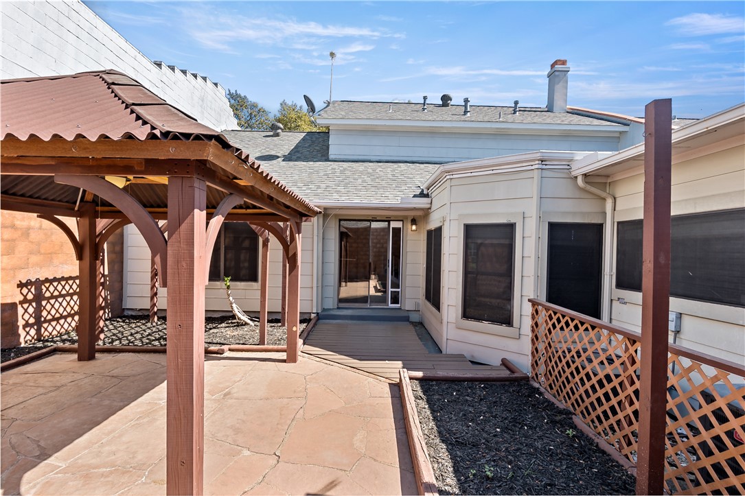 904 Bob White Street Bryan, TX 77802 - Photo 28 of 36 a view of a patio with table and chairs