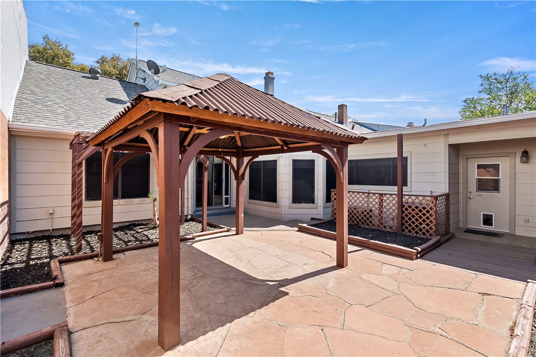 904 Bob White Street Bryan, TX 77802 - Photo 29 of 36 a view of a house with wooden fence