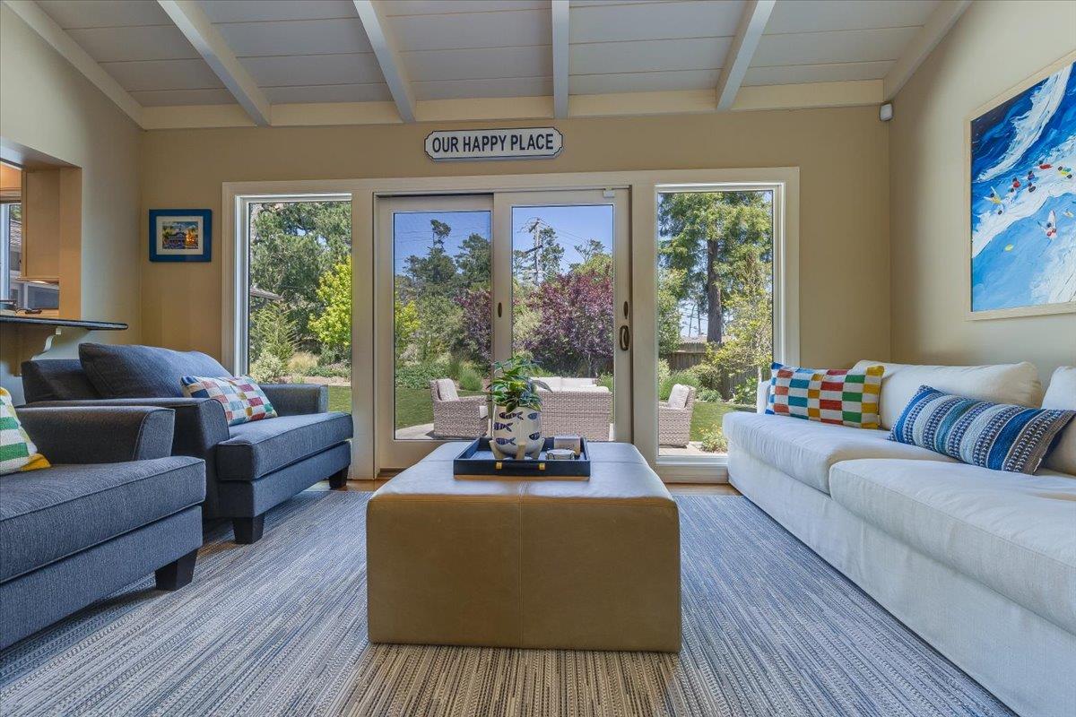 4117 Sunridge Road Pebble Beach, CA 93953 - Photo 14 of 46 a living room with furniture and a large window