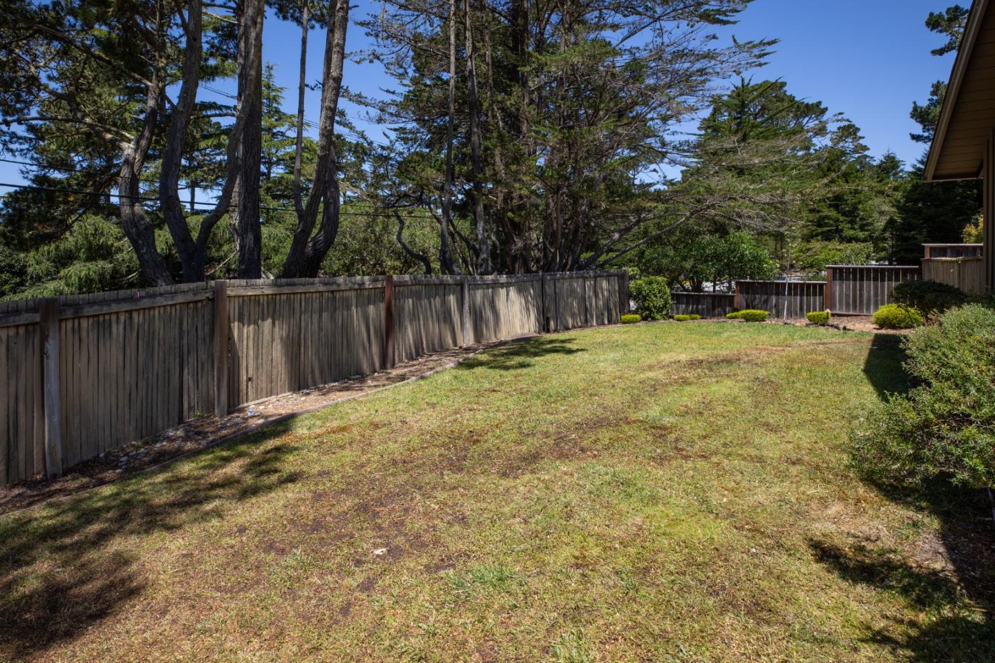 4117 Sunridge Road Pebble Beach, CA 93953 - Photo 38 of 46 a swimming pool with wooden fence