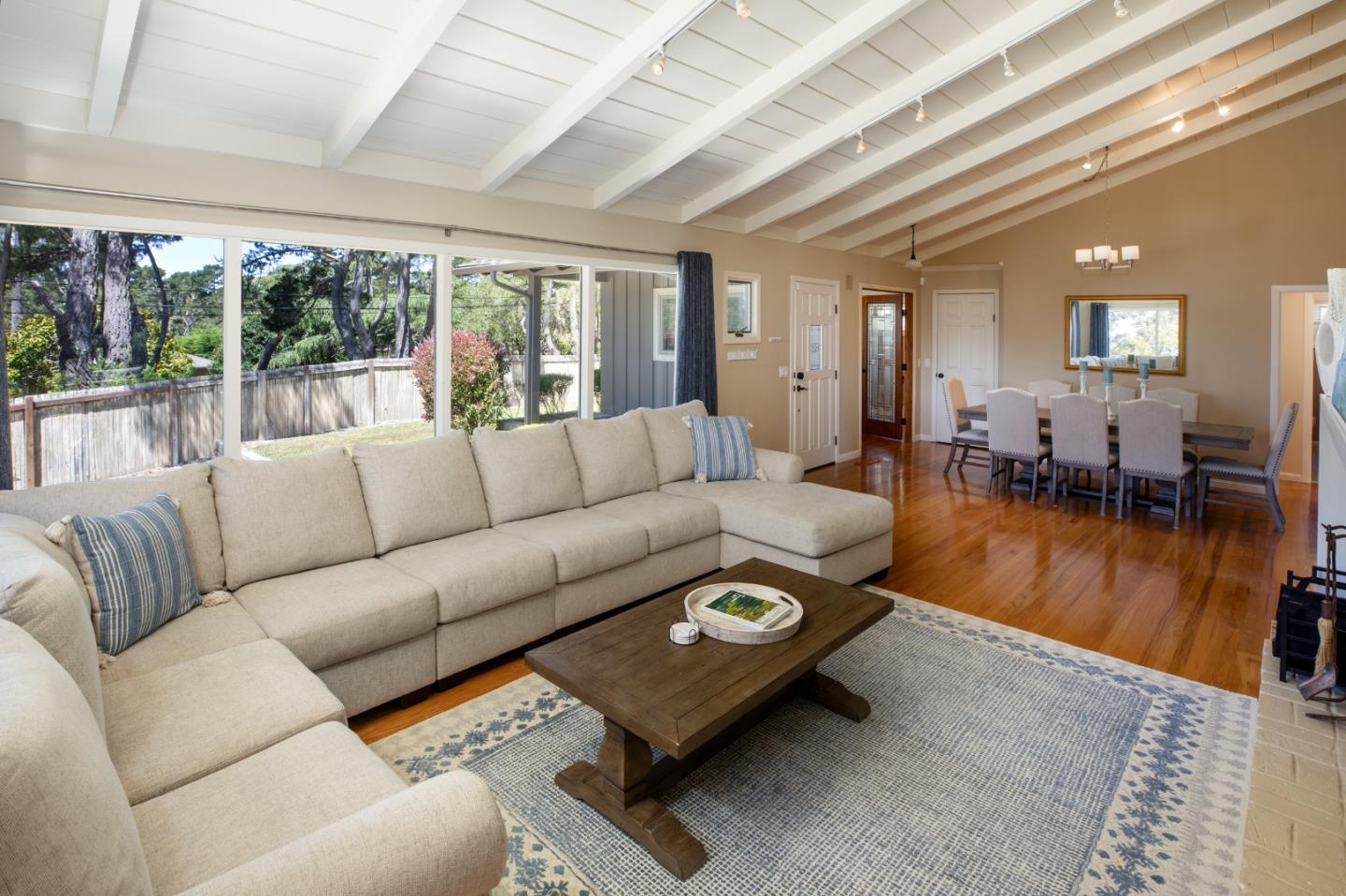 4117 Sunridge Road Pebble Beach, CA 93953 - Photo 5 of 46 a living room with furniture and a large window