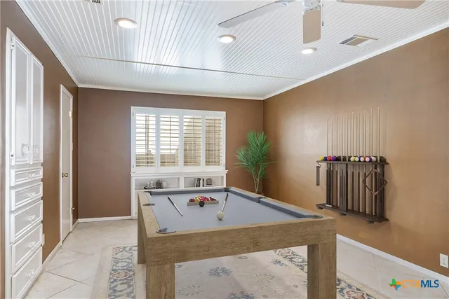 a view of kitchen with furniture and natural light
