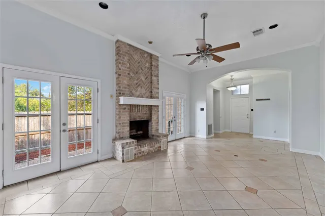 a view of a kitchen with cabinet and a chandelier fan