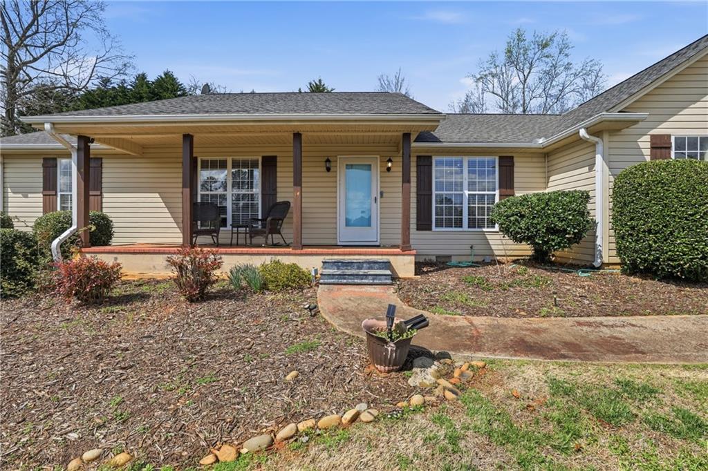 4564 Highway 51 Lula, GA 30554 - Photo 2 of 46 front view of a house with a yard