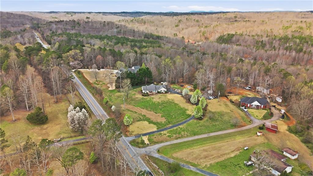 4564 Highway 51 Lula, GA 30554 - Photo 45 of 46 a view of a swimming pool with a yard