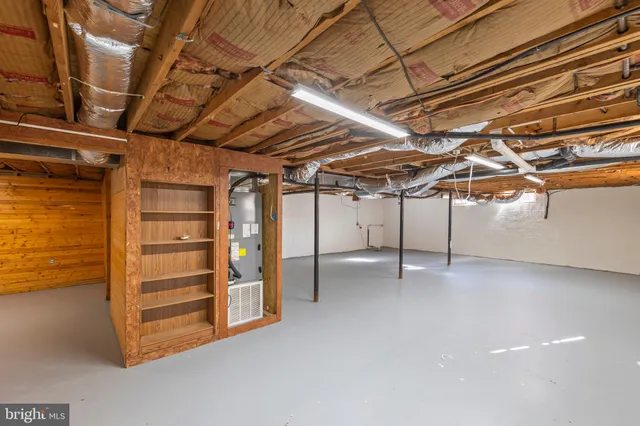 a view of room with an empty shelves