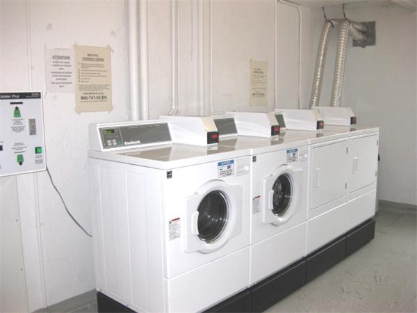 147 Turner Road, Unit 95 Holliston, MA 01746 - Photo 9 of 10 a utility room with dryer and washer