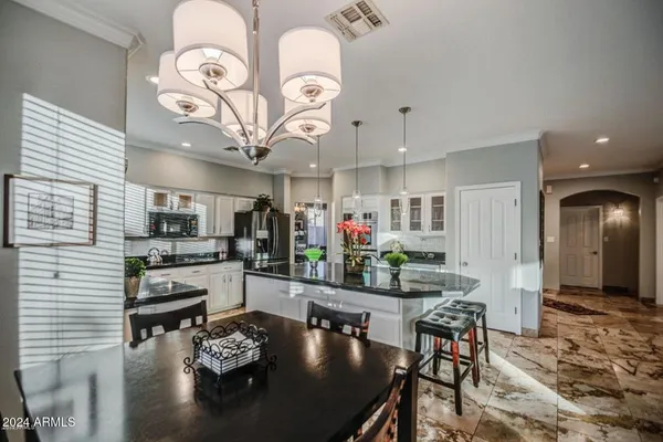 a living room with dining table