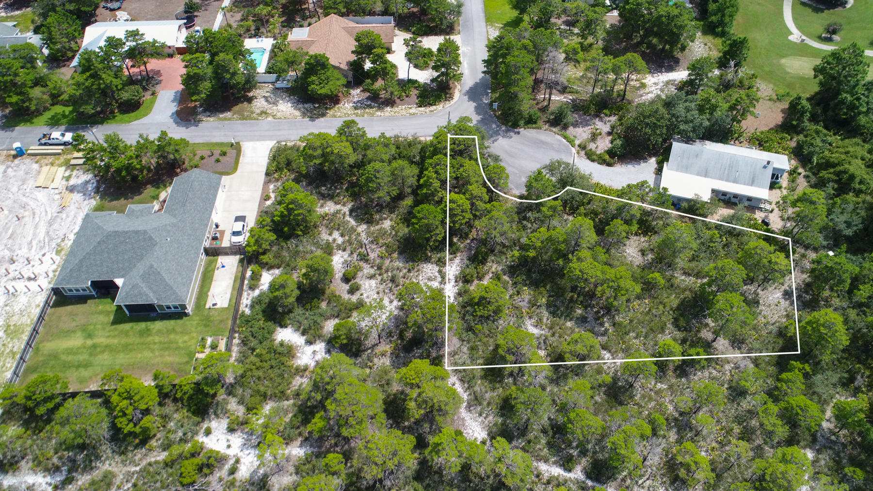 Lot 11 Lot Road Santa Rosa Beach, FL 32459 - Photo 1 of 15 an aerial view of a house with pool yard and outdoor seating