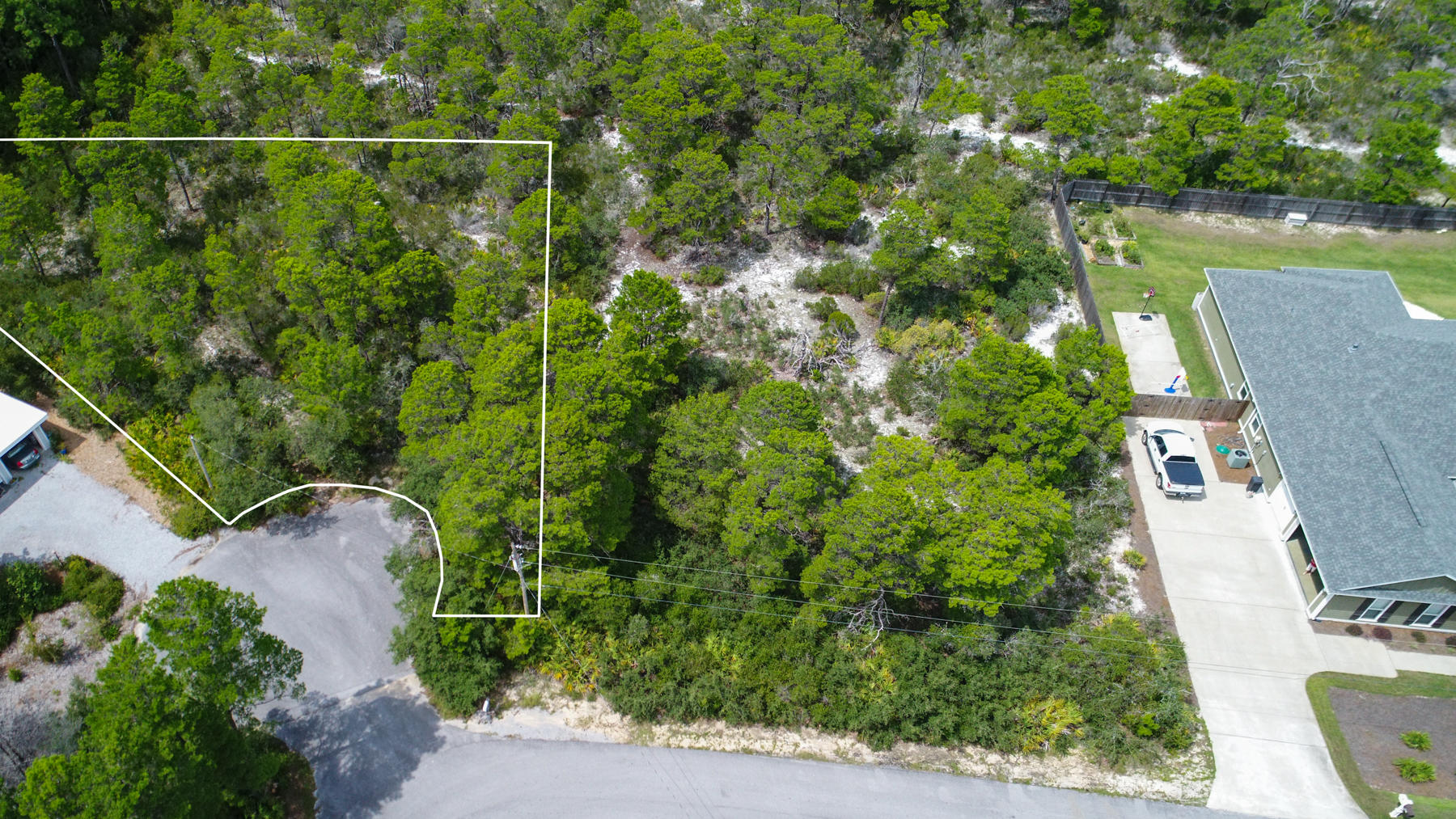 Lot 11 Lot Road Santa Rosa Beach, FL 32459 - Photo 10 of 15 an aerial view of a houses with a yard and trees