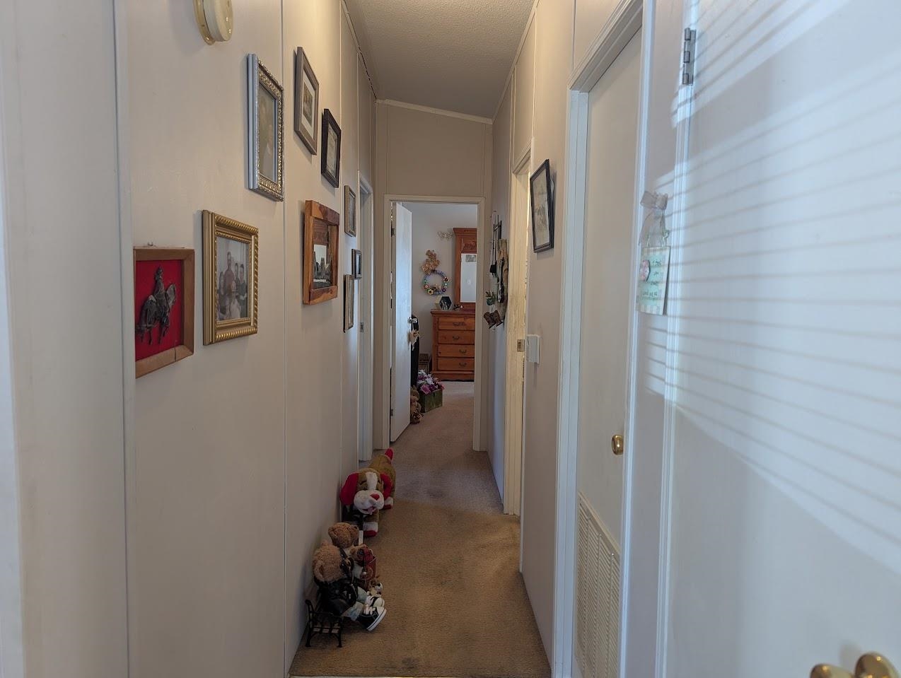 435 32 Road, Unit 405 Clifton, CO 81520 - Photo 12 of 26 a view of a hallway with closet