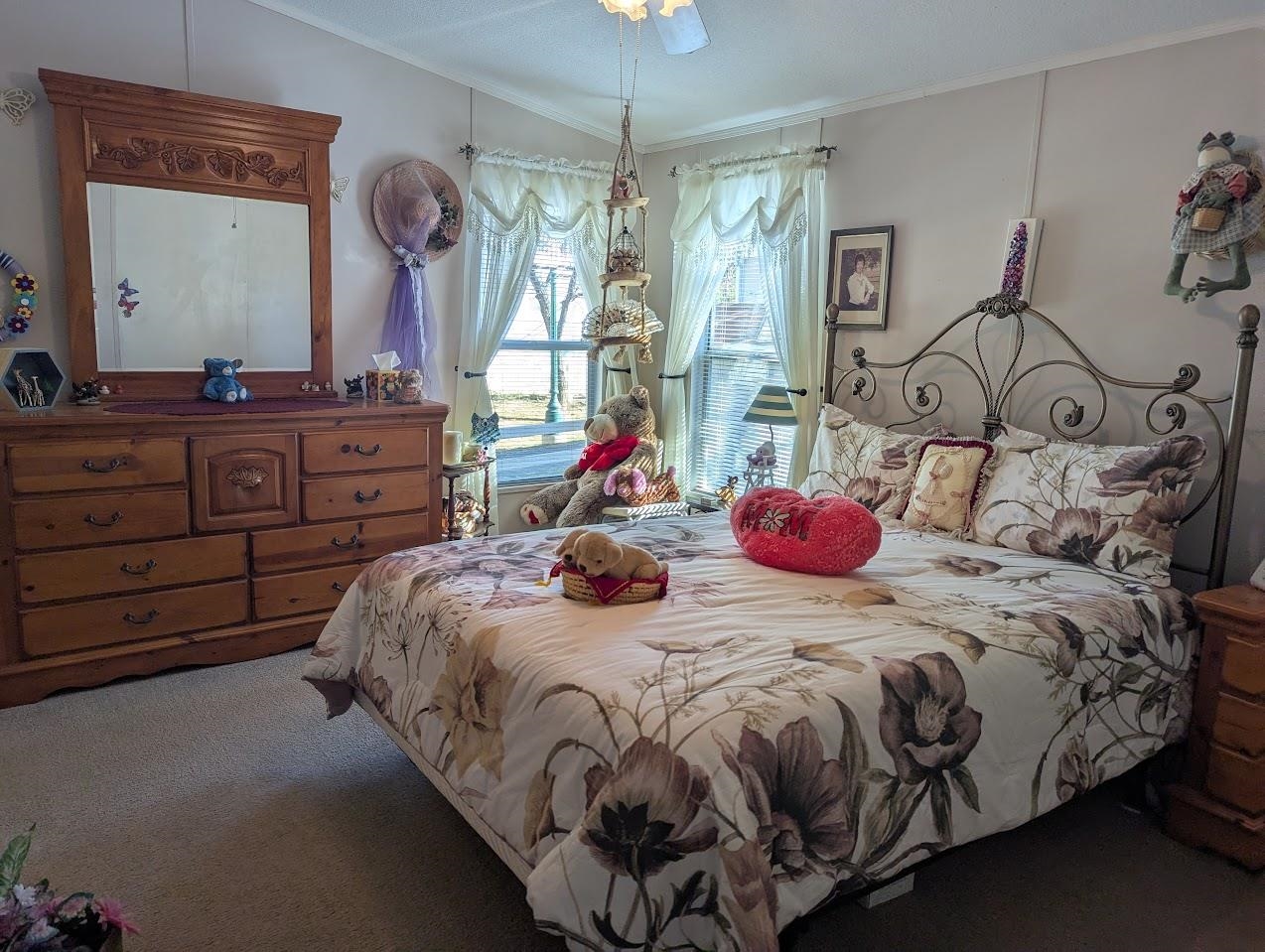 435 32 Road, Unit 405 Clifton, CO 81520 - Photo 14 of 26 a bedroom with a bed and window