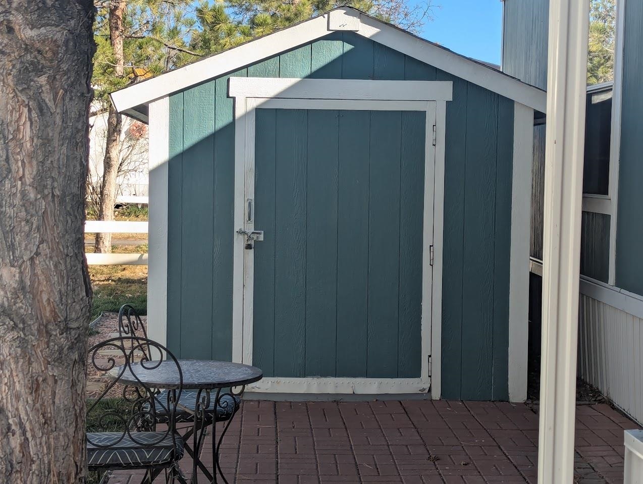 435 32 Road, Unit 405 Clifton, CO 81520 - Photo 26 of 26 a backyard of a house with table and chairs