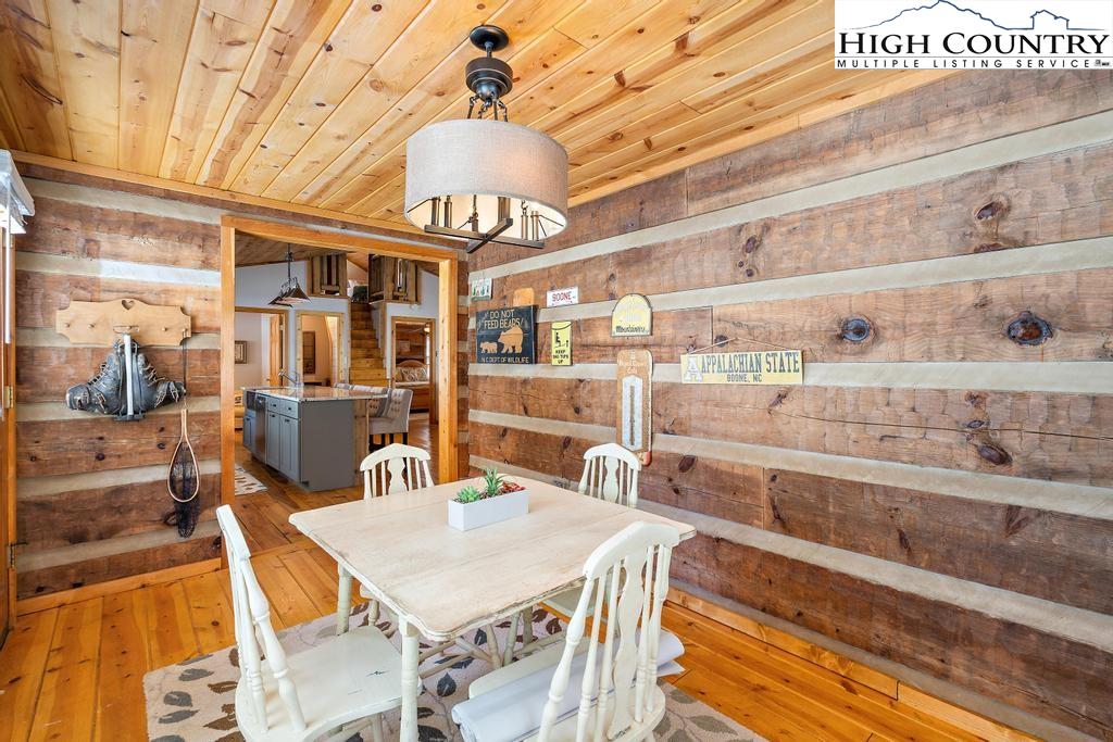 3855 Howard's Creek Road Boone, NC 28607 - Photo 9 of 38 a view of a dining room with furniture