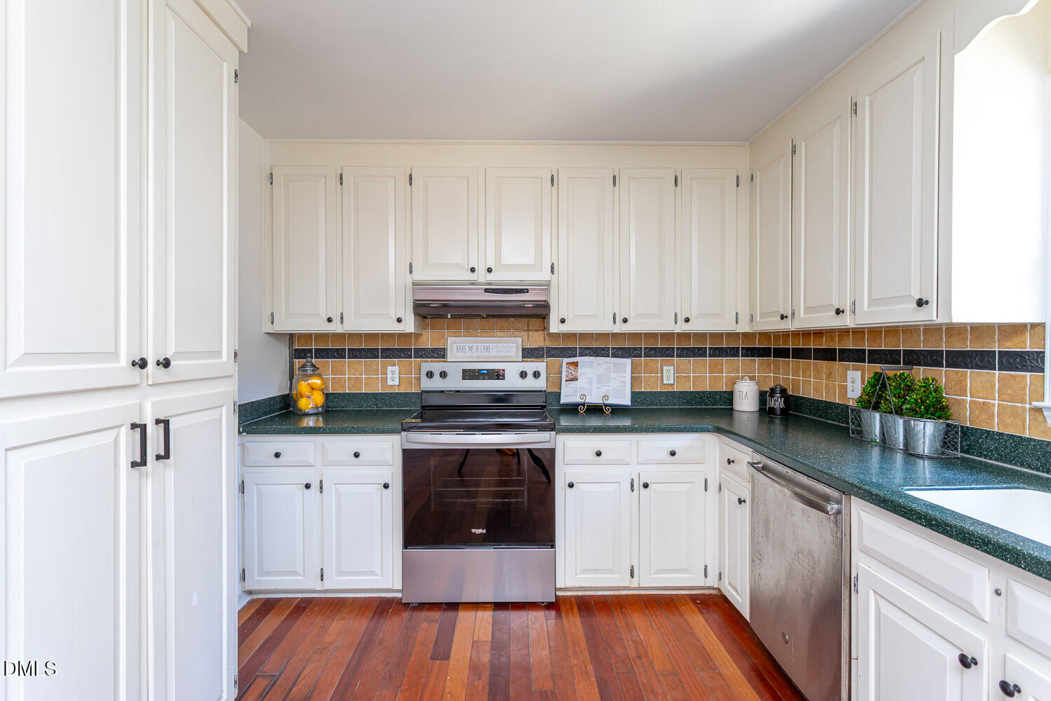 10609 Orchid Lane Raleigh, NC 27603 - Photo 8 of 27 Kitchen equipped with new dishwasher and newer electric range