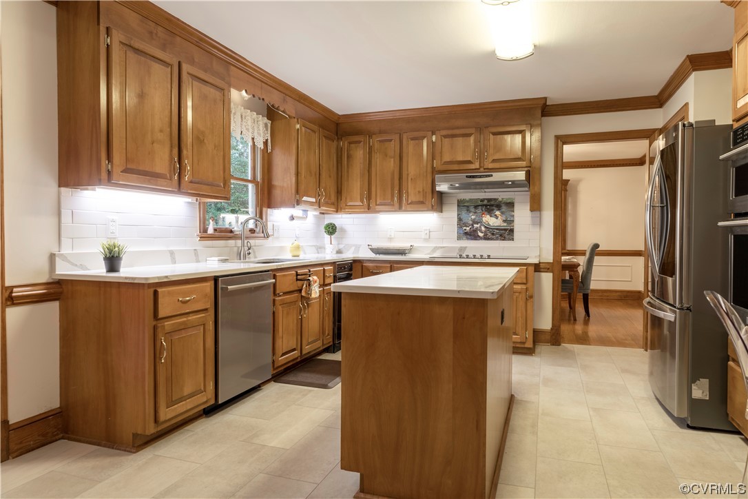 8949 Cardiff Road North Chesterfield, VA 23236 - Photo 15 of 49 a kitchen with a sink stove and cabinets