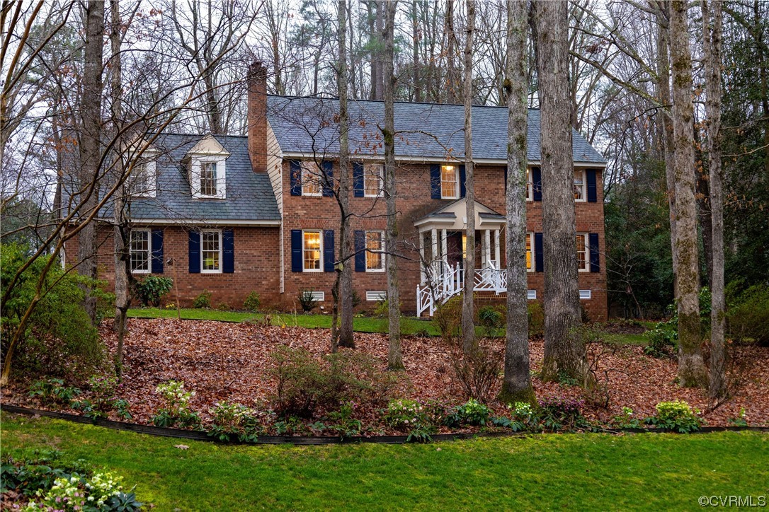 8949 Cardiff Road North Chesterfield, VA 23236 - Photo 2 of 49 a front view of a house with garden