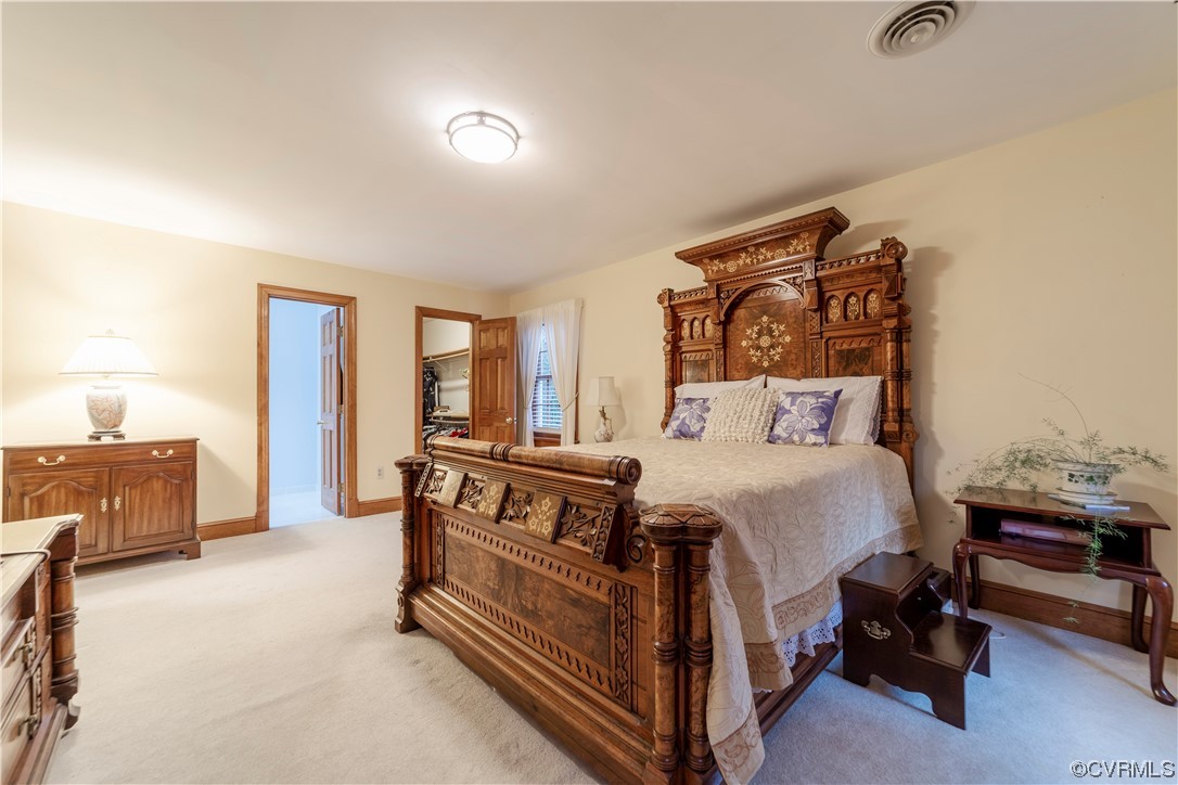 8949 Cardiff Road North Chesterfield, VA 23236 - Photo 26 of 49 a bed room with a bed and a dresser