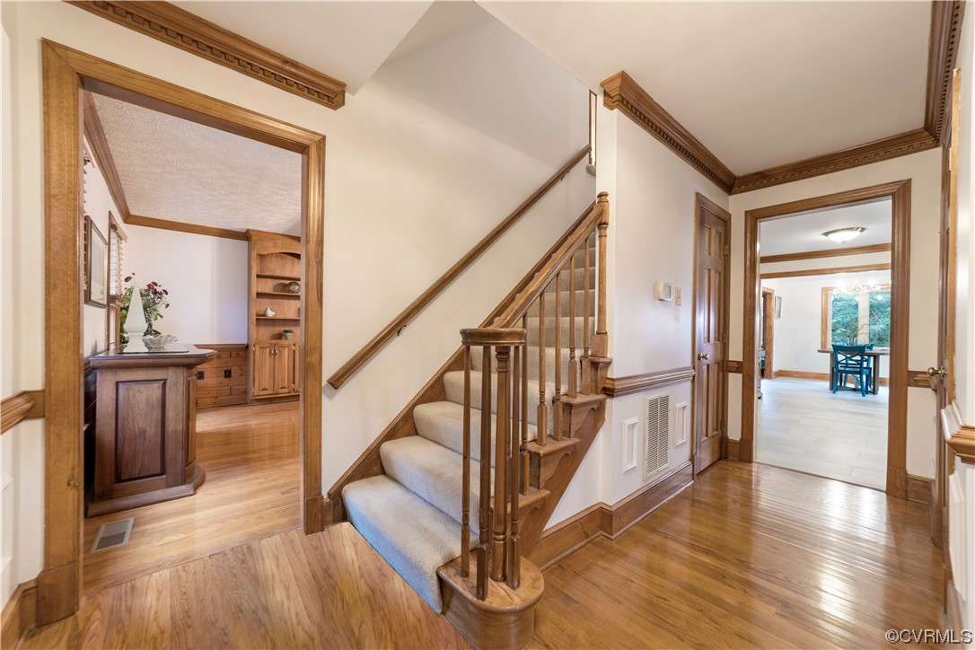 8949 Cardiff Road North Chesterfield, VA 23236 - Photo 4 of 49 a view of entryway and hall with wooden floor