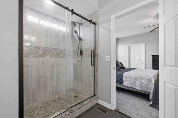 a view of bedroom and bathroom