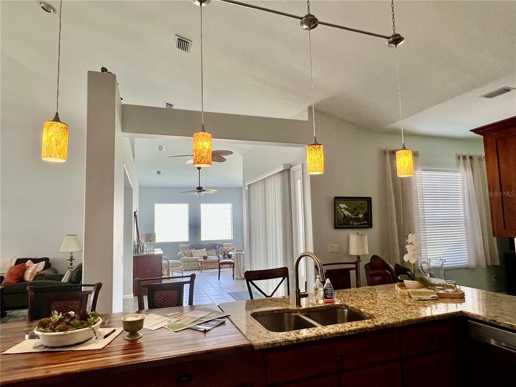 2515 Northwest 53rd Avenue Road Ocala, FL 34482 - Photo 24 of 94 a kitchen with a sink appliances and cabinets