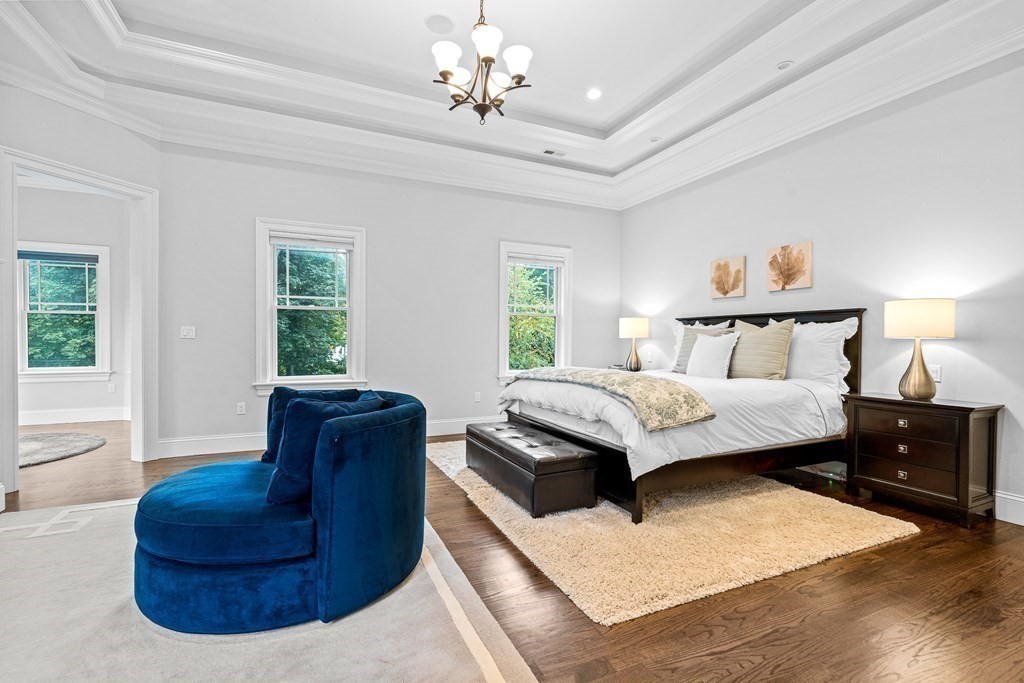 3 Ravine Road Winchester, MA 01890 - Photo 26 of 42 a bedroom with a bed window and couch