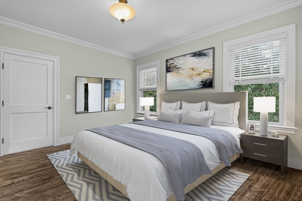 3 Ravine Road Winchester, MA 01890 - Photo 35 of 42 a bedroom with a bed and wooden floor