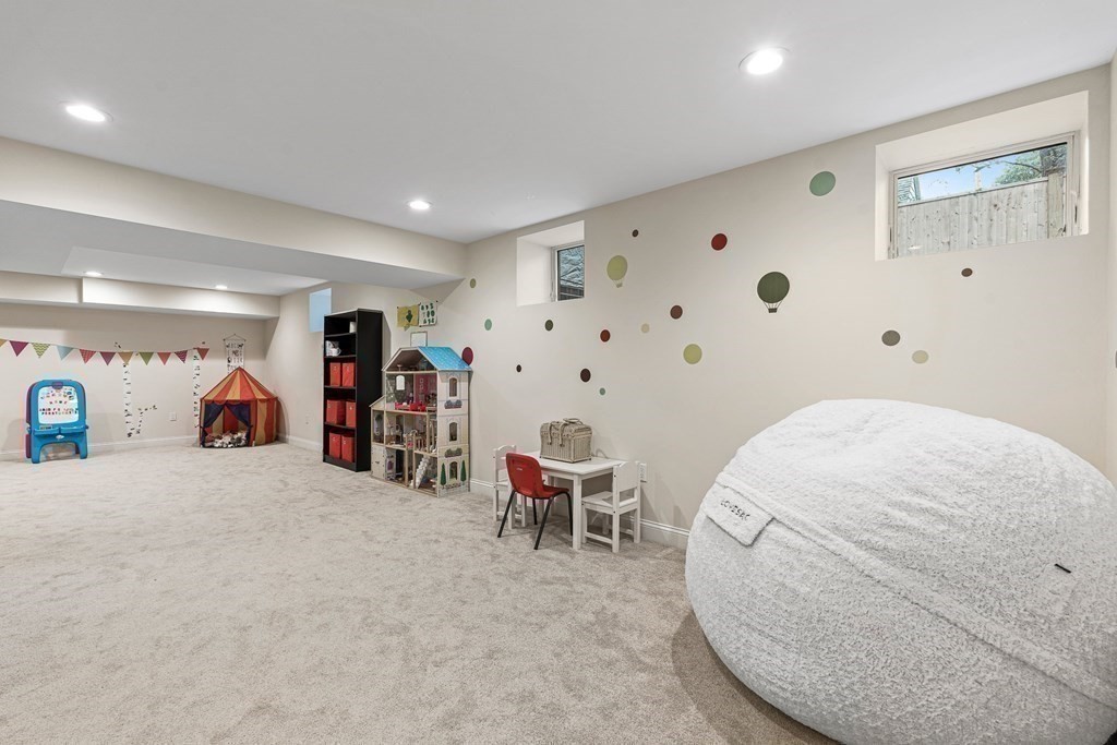 3 Ravine Road Winchester, MA 01890 - Photo 39 of 42 a living room with furniture and a chair