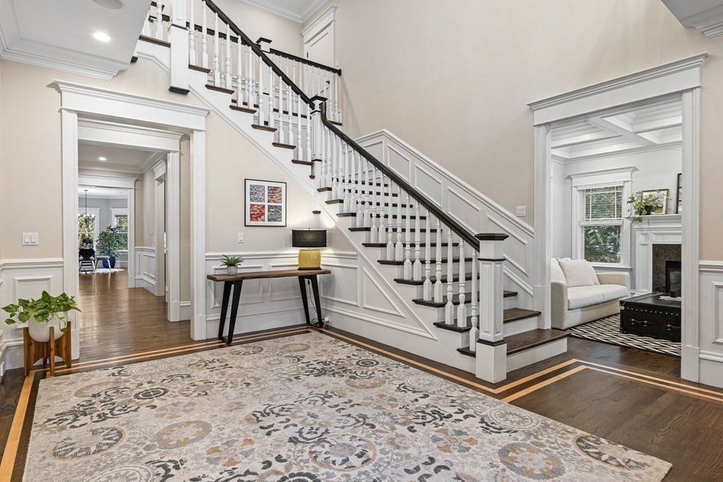 3 Ravine Road Winchester, MA 01890 - Photo 7 of 42 a view of entryway dining room and hall with wooden floor