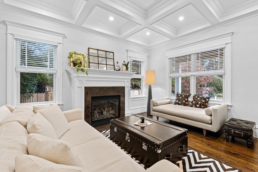 3 Ravine Road Winchester, MA 01890 - Photo 9 of 42 a living room with furniture and a fireplace