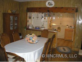 187 Southern Street Rutherfordton, NC 28139 - Photo 3 of 9 a dining room with a table and chairs