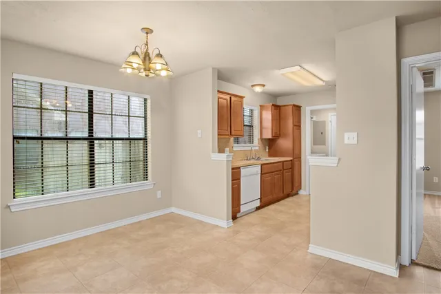 a view of a kitchen with a sink