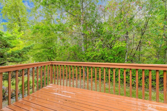 a balcony with wooden floor
