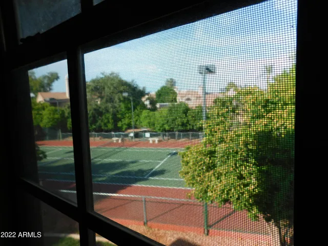 a view of yard from a balcony