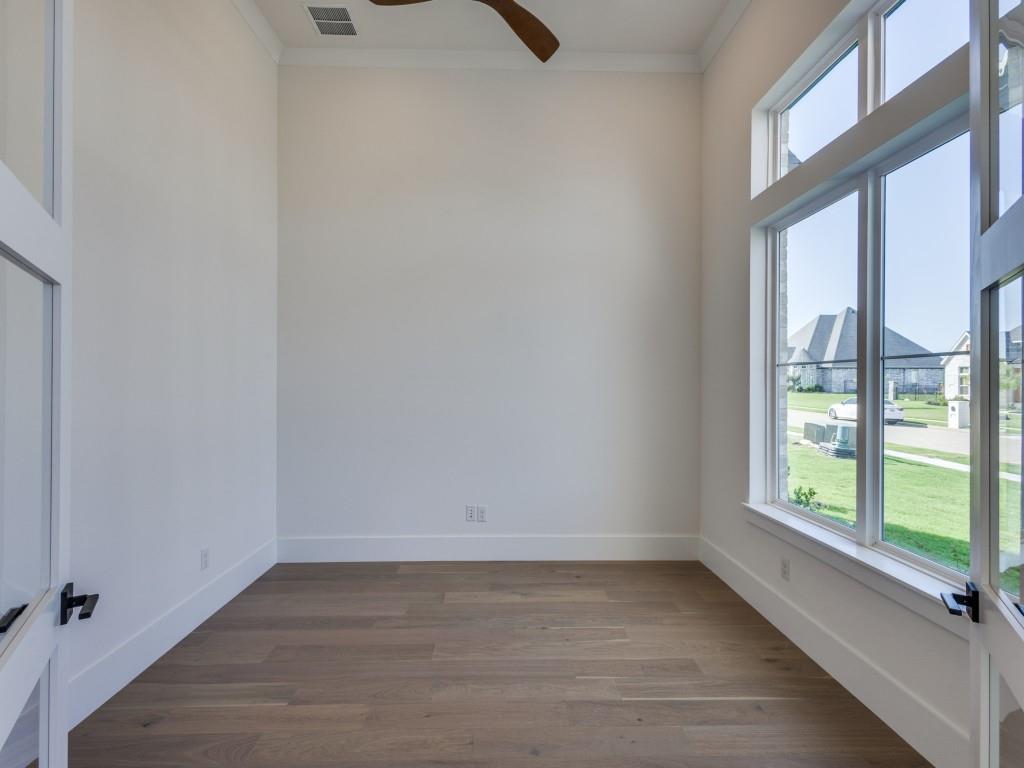 1045 Bent Tree Lane Gunter, TX 75058 - Photo 11 of 25 a view of a small space with wooden floor and a window