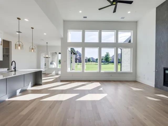 a view of a kitchen with a sink and a window