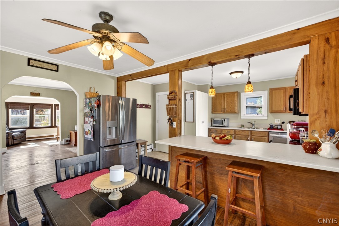 305 Newcastle Road Geddes, NY 13219 - Photo 9 of 29 Dining Room flows easily into the Kitchen and Grea